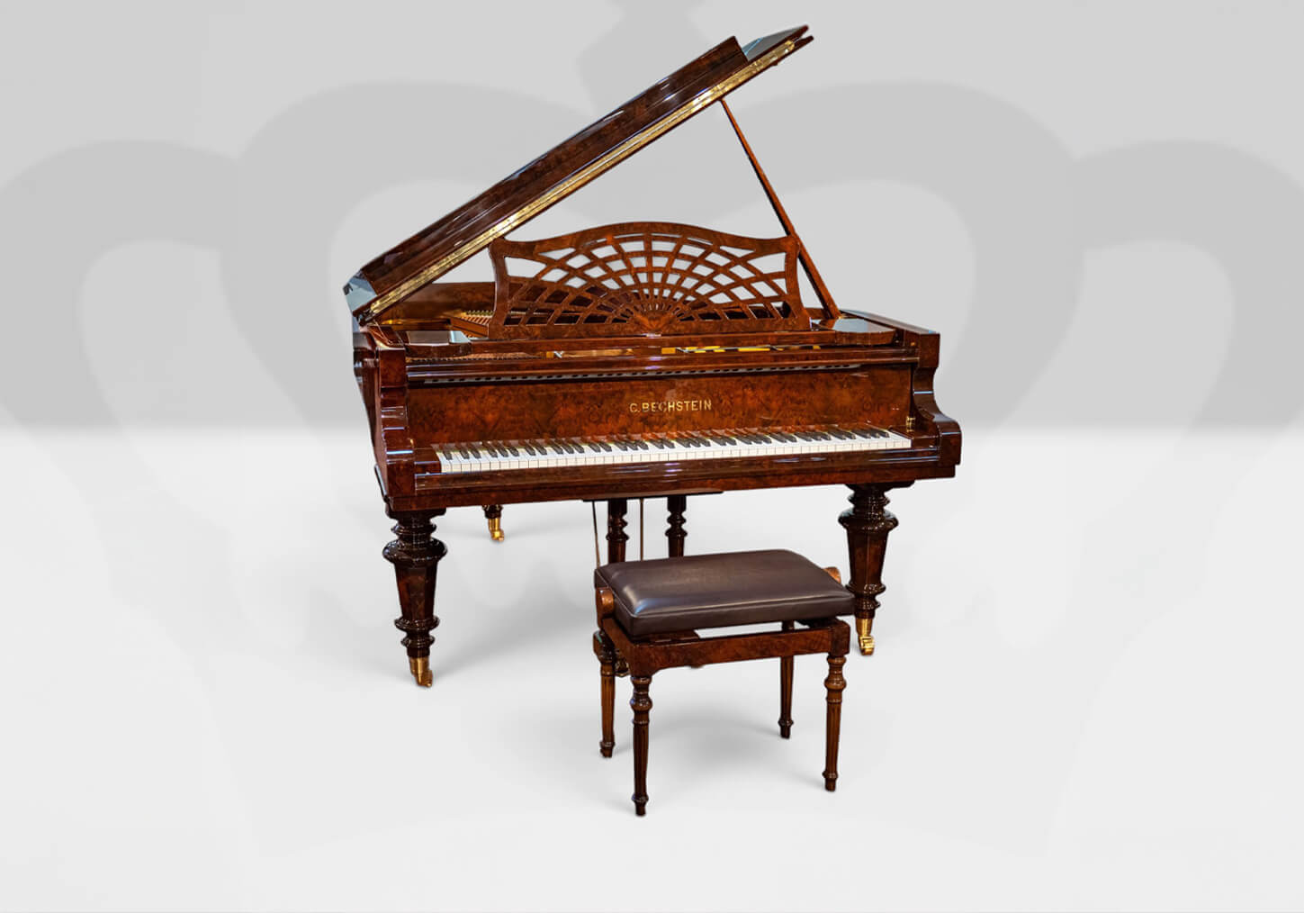 Un chef-d'œuvre du piano : Bechstein A189 en ronce de noyer sculpté